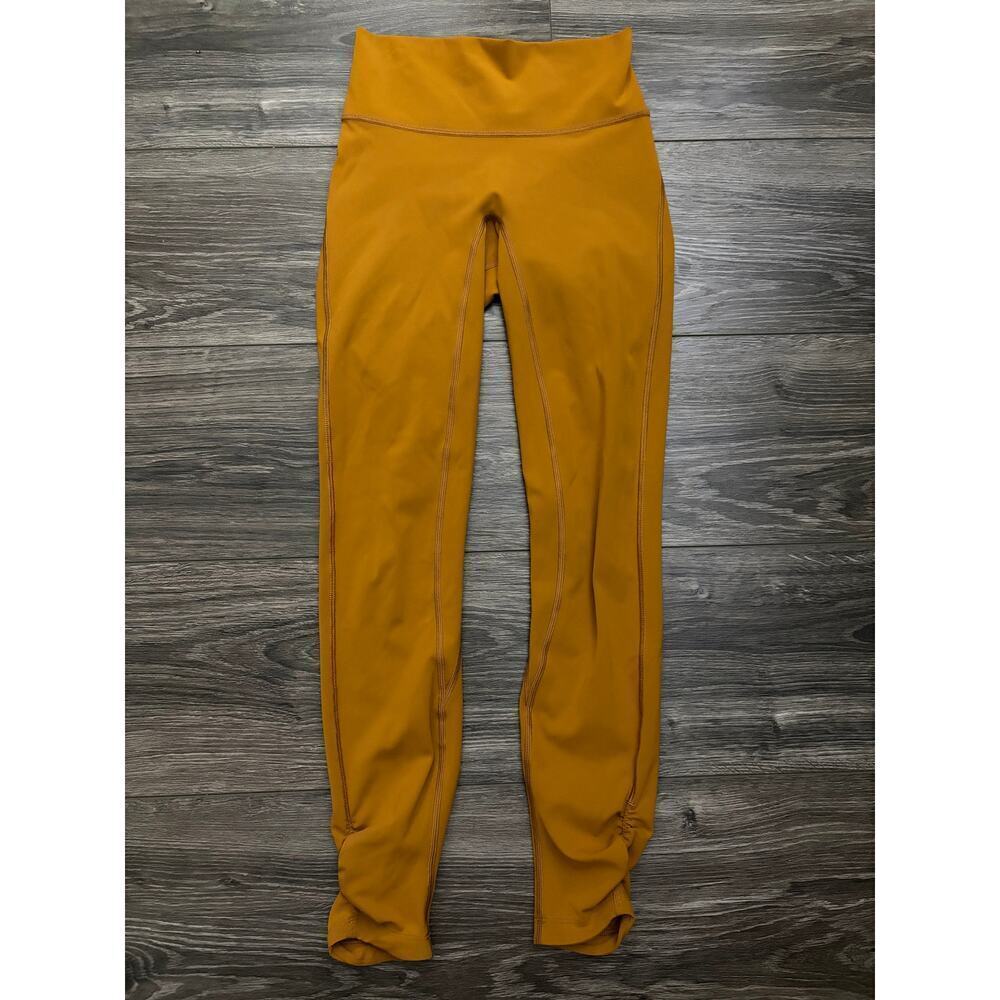 Lululemon Awakening HR Tight 25" Fools Gold Brown size 2